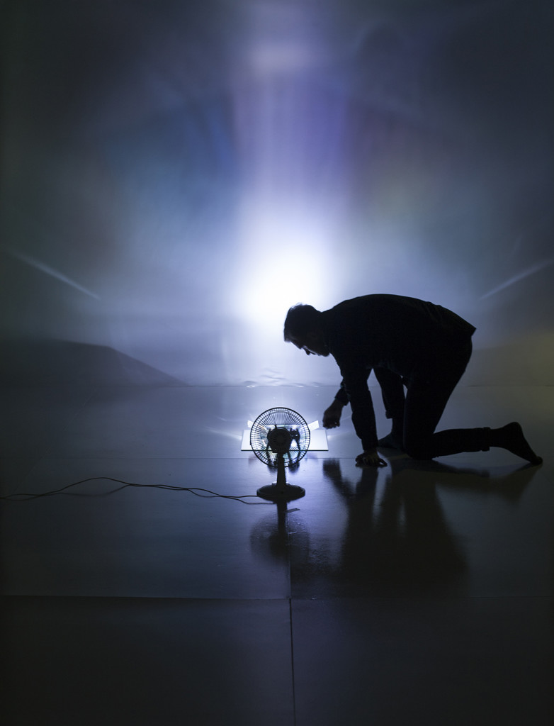 Dichroic Ripple, 2015. Installation with fan, flashlights, water filled ovenware and dichroic glass. 